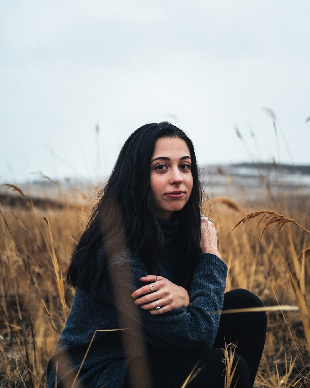 Young woman with dark hair smiling portrait